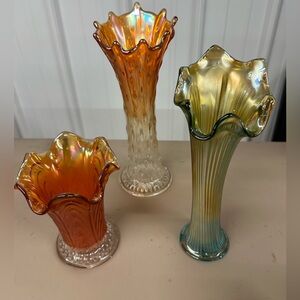 Set of three Fenton Carnival vases.